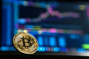 gold-colored Bitcoin. Cryptologiciq - Trading strategy